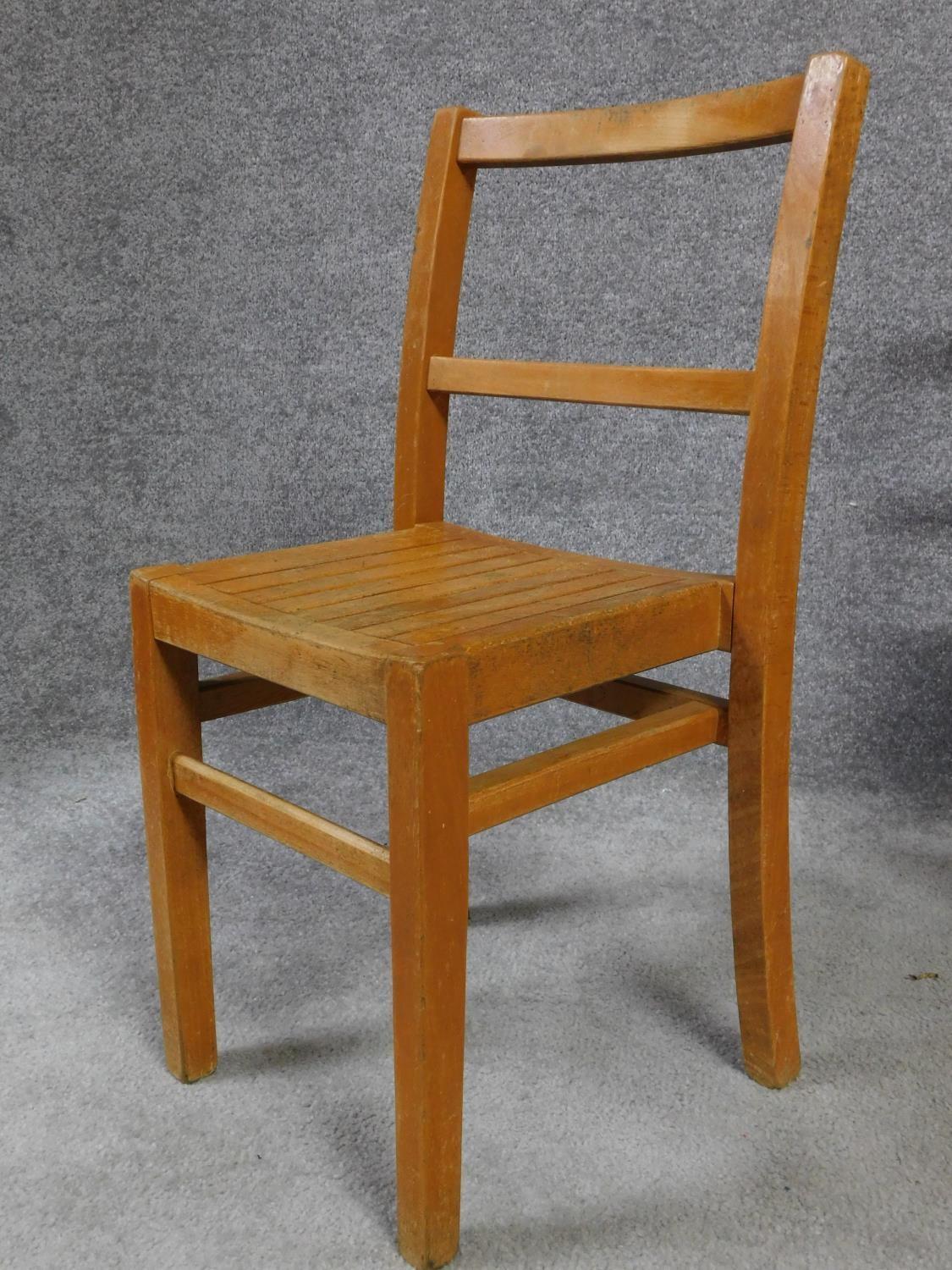 Four vintage oak children's school chairs on square stretchered supports. H.69cm - Image 2 of 3
