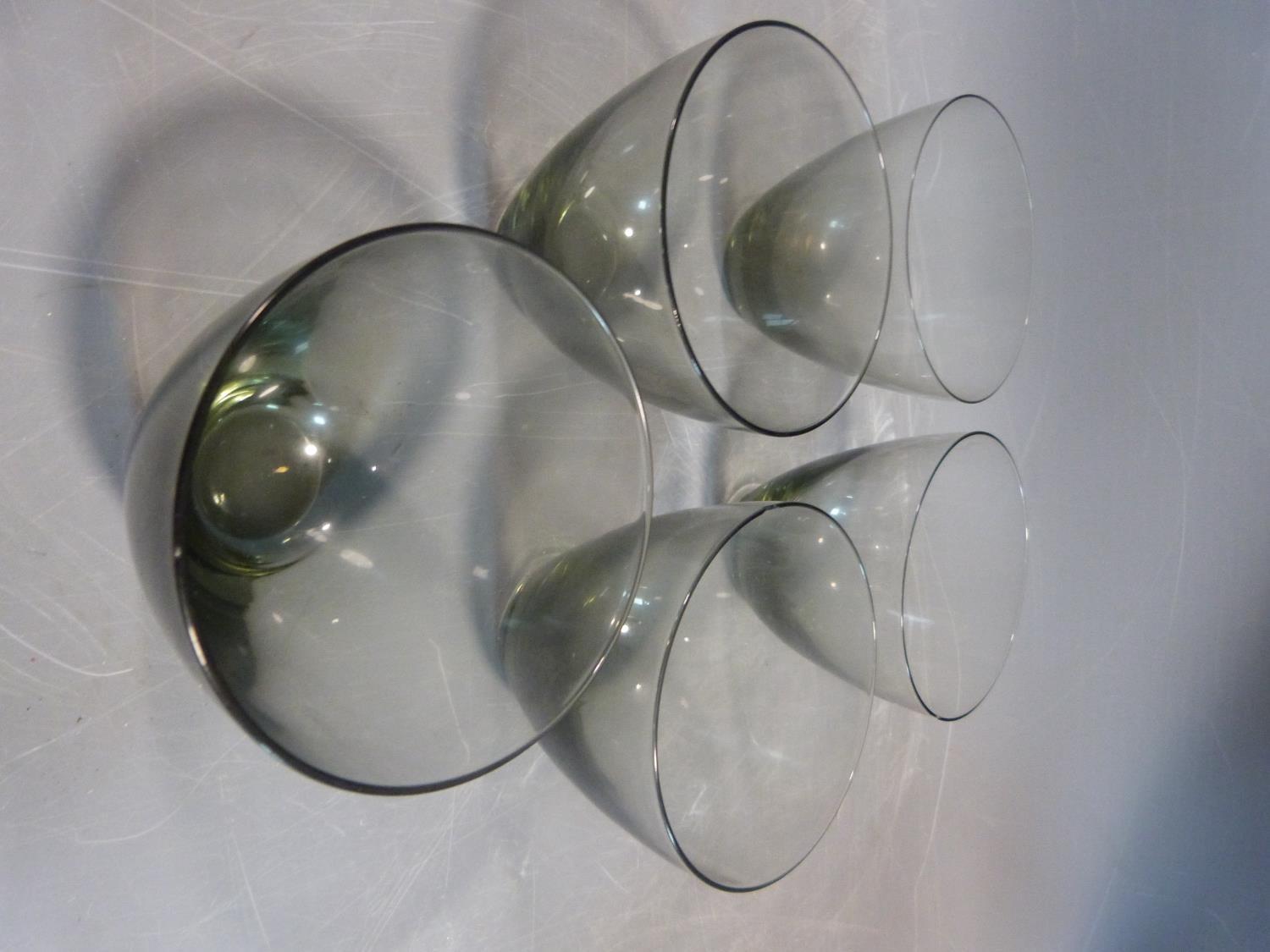 Six mid century glass blue grey bowls and six smokey grey drinking glasses. Possibly Danish. H 9. - Image 8 of 12