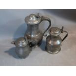 Two antique lidded petwer tankards and a jug, circa 1800. Stamped London, Crown and Rose. The