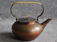 A Vintage Zint Handarbeit German copper tea kettle. With woven plastic covering to the handle and