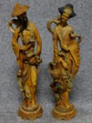 A pair of Chinese style moulded figures. H.50cm