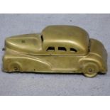 A vintage brass Betel Motor Car artist's box. Has hinged lid and removable palettes. One of the