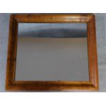 A vintage pine framed mirror. 86x75cm