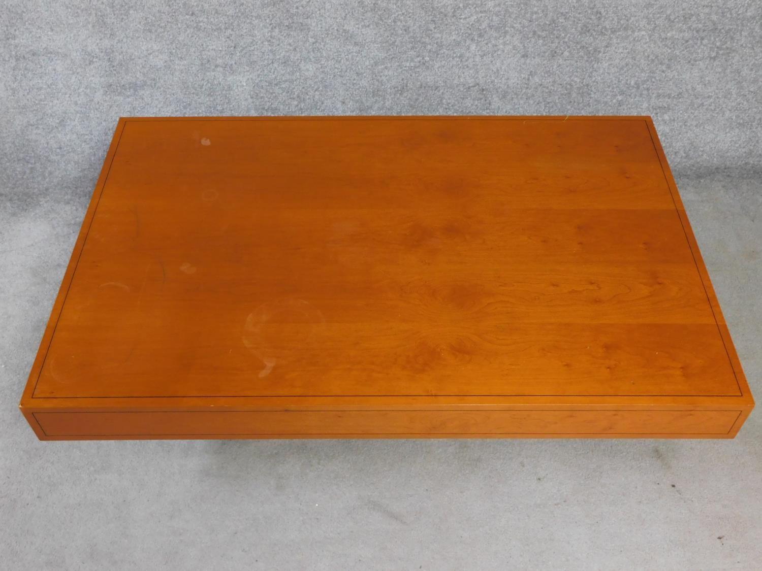 A contemporary teak rectangular coffee table on plinth base. H.38 L.140 W.90cm - Image 2 of 3