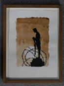 A framed and glazed watercolour of a silhouette of a soldier standing on rubble and barbed wire.