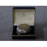 A Victorian boxed silver yoyo by American silversmiths Gorham and Co with repousse floral design,