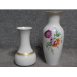 A KPM handpainted porcelain vase with floral design along with a Thomas gilded white porcelain vase.
