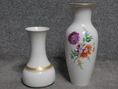 A KPM handpainted porcelain vase with floral design along with a Thomas gilded white porcelain vase.