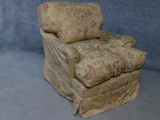 A Howard style fully upholstered armchair by George Smith on brass casters. H.80cm (Provenance