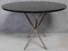 A contemporary marble top table with folding chrome base. H.63 L.91 W.91cm