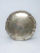 A German silver tray with scalloped edge. Stamped to the base with German hallmarks, 830S.