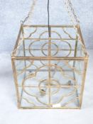 A Julian Chichester gold 'Anna' design pierced metal hanging ceiling lantern with stylised floral