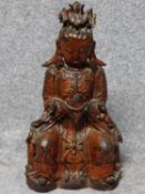 Possibly Ming dynasty Chinese gilt lacquered bronze seated figure of Guanyin. From a private