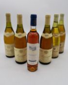 Six various bottles of wine to include1979 Chablis Premier Cru, 1988 Meursault and others.