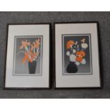 A pair of framed and glazed prints, flowers, signed by the artist. H.58x42cm