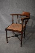 An Edwardian mahogany corner chair. H.74x50cm