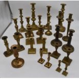 An extensive collection of various pairs of 19th century and later candlesticks. Tallest H.30cm (