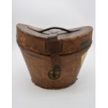 A silk top hat by Christy's London in fitted leather carrying case. H.30x35cm (box)