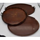 A late 19th century mahogany and satinwood inlaid twin handled tray and two other similar trays. L.