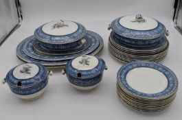 A blue and white part dinner service to include seven dinner plates, side plates, large graduating