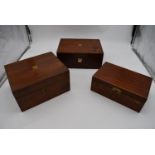 A 19th century walnut fitted box and two other similar boxes. H.14x28cm