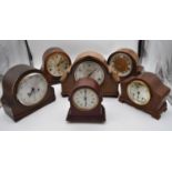 A miscellaneous collection of six mid 20th century mantel clocks. One by JW Benson of London. H.