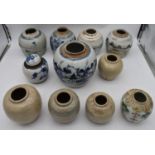 A collection of eleven antique Chinese ginger jars, one painted with lotus flowers and lucky bats.