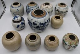 A collection of eleven antique Chinese ginger jars, one painted with lotus flowers and lucky bats.