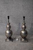 A pair of metal double gourd shaped table lamps. H.60cm