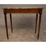 A 19th century mahogany console table with grey marble top on reeded tapering supports. H.75x82x43cm