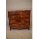 A Georgian mahogany and satinwood inlaid bowfronted chest of drawers on swept bracket feet. H.