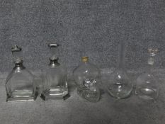 A miscellaneous collection of five contemporary decanters. H.32cm