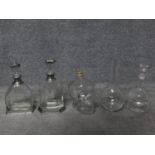 A miscellaneous collection of five contemporary decanters. H.32cm