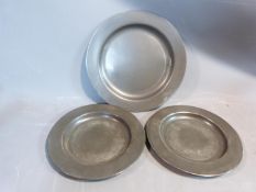 Three antique pewter plates, circa 1800. Largest stamped to reverse with makers mark for James Yates