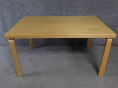 An Alvar Aalto style table, artek label to underside. H.76 L.136 D.85cm