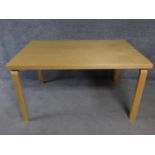 An Alvar Aalto style table, artek label to underside. H.76 L.136 D.85cm