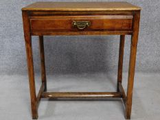 A 19th century oak hall table with frieze drawer on square stretchered supports. H.72 L.65 W.41cm