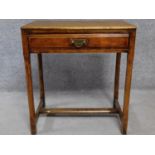A 19th century oak hall table with frieze drawer on square stretchered supports. H.72 L.65 W.41cm