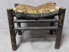 A Chinese bamboo stool on circular section stretchered supports. H.46 W.55 D.41cm