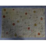 A contemporary floral rug with repeating flower motifs on a beige field 188x128cm