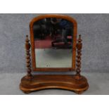 A 19th century walnut swing dressing mirror with original glass plate. H.66cm