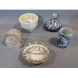 A collection of studio pottery. Including an antique ceramic jelly mould, woven Italian ceramic