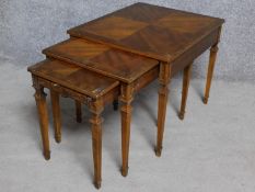 A Georgian style walnut nest of three graduating occasional tables on square tapering supports. H.54