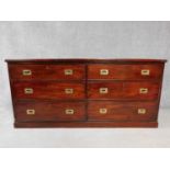 A Georgian style mahogany military chest of six drawers on plinth base. H.81 W.171 D.54cm
