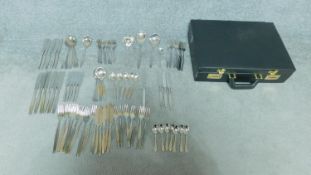 A cased vintage WMF stainless steel part cutlery set, eighty two pieces in the set. The cutlery