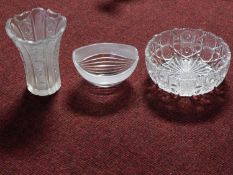 A collection of glassware. Including heavy star and abstract shape cut crystal fruit bowl and