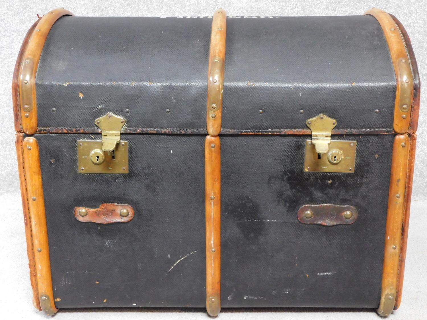 An antique teak and brass bound steamer trunk with twin leather carrying handles. H.62 W.80 D.53cm - Image 2 of 9