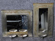 Two Eastern engraved metal wall mirrors fitted with candle sconces. 31x28cm (largest)