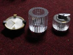 A vintage Rosenthal crystal starburst table lighter and matching match holder/candle holder along