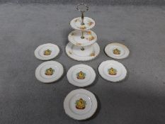 A vintage three tier floral design cake stand by Clarice Cliff along with a set of six Royal